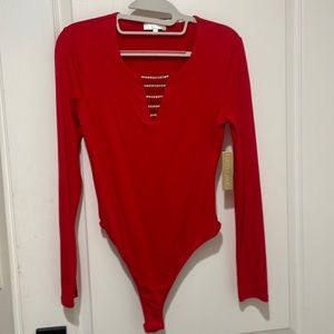Never worn- brand new red bodysuit